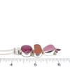 Pink Sea Glass and Ruby Etched Bail Necklace on ruler for size reference.