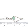 Seafoam Sea Glass and Peridot Trinity Halo Necklace on ruler for size reference.
