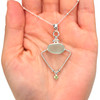Seafoam Sea Glass and Peridot Trinity Halo Necklace on model for color reference.