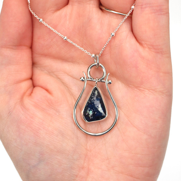 Ocean Depths Ancient Roman Glass Gauntlet Necklace on model for color reference.