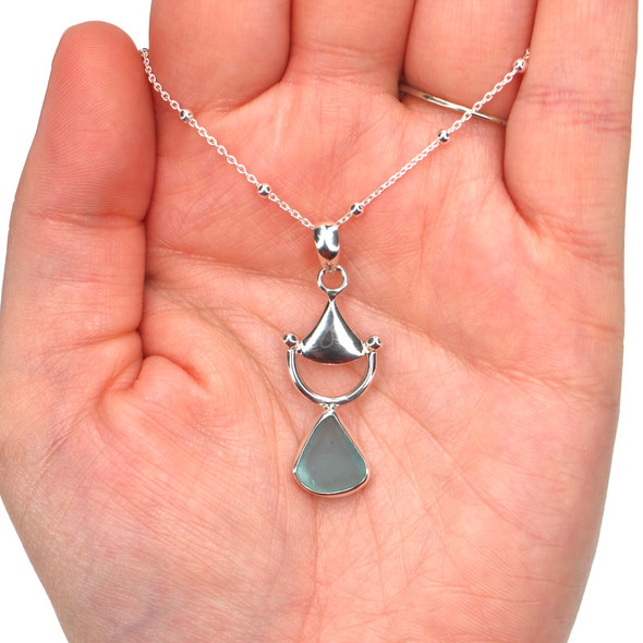 Aqua Sea Glass Bit Necklace on model for color reference.