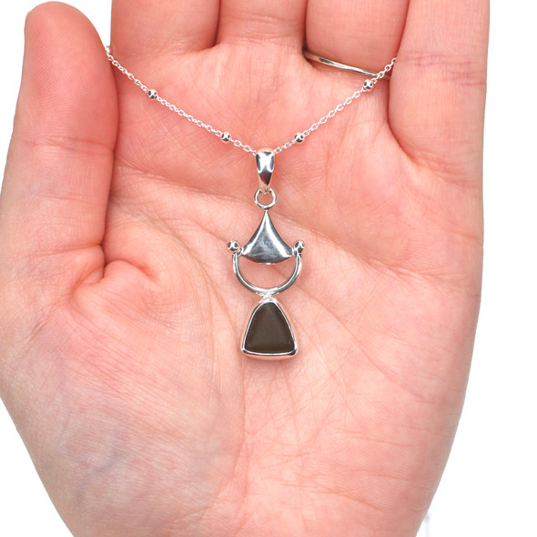 Olive Sea Glass Bit Necklace on model for color reference.