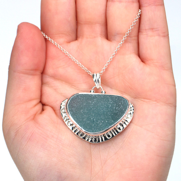 Aqua Sea Glass Enchanted Cove Necklace on model for color reference.