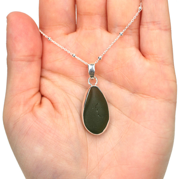 Olive Elongated Sea Glass Single Bezel Necklace on model for color reference.