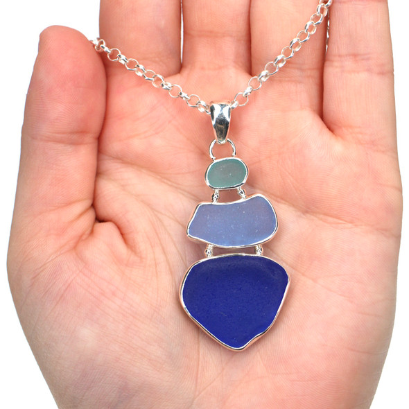 Beautiful Blues Sea Glass Three Tier Necklace on model for color reference.
