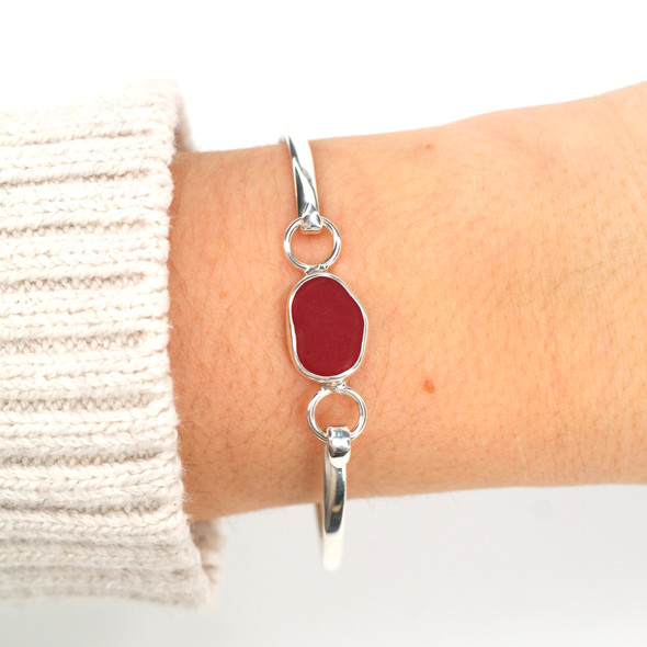 Red Bright Sea Glass Bezel Bangle Bracelet on model for color reference.