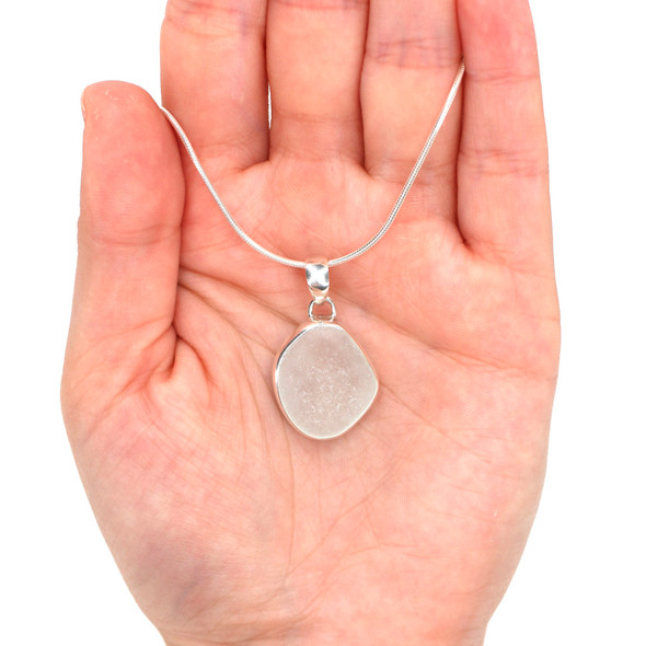White Sea Glass Single Bezel Necklace on model for color reference. White Sea Glass Single Bezel Necklace on model for color reference.
