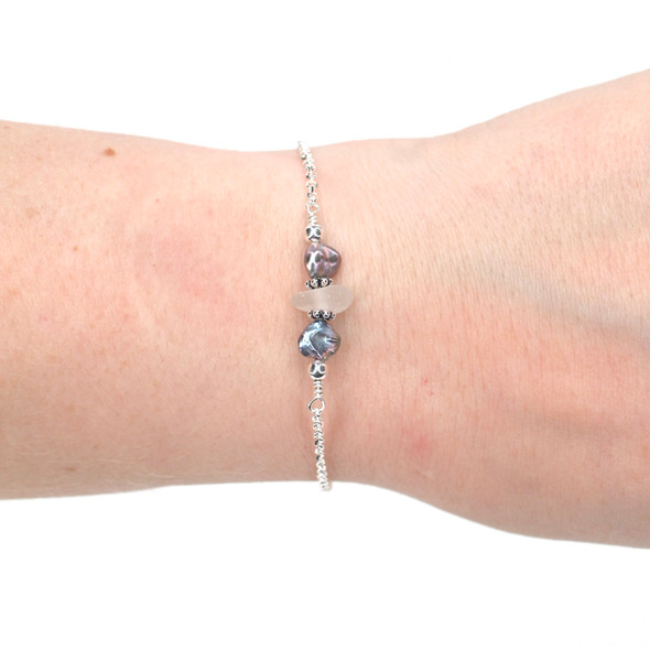Winter White Crisp Sea Glass and Dainty Peacock Pearl Bracelet on model for color reference.