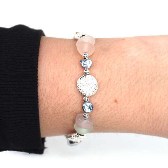 Pink and Purple Pastel Sea Glass Shimmer Beaded Bracelet on model for color reference.