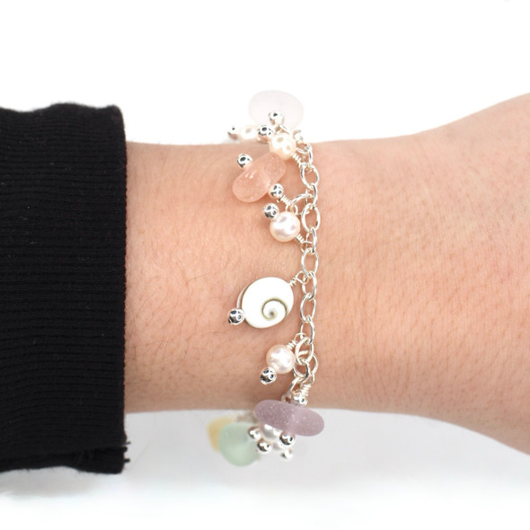 Pastel Bright Sea Glass and Shiva Shell Charm Bracelet on model for color reference.