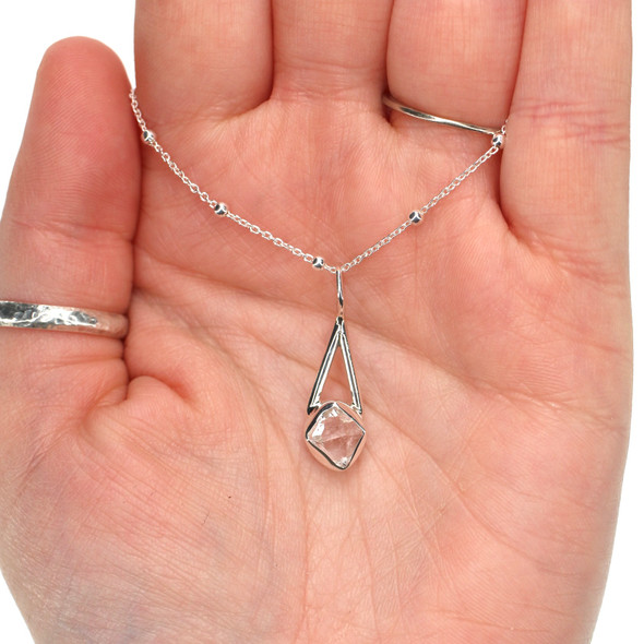 Herkimer Diamond Lunar Drop Charm #3 on model for color reference.
