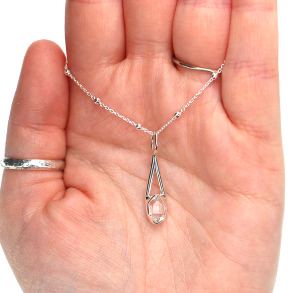 Herkimer Diamond Lunar Drop Charm #6 on model for color reference.