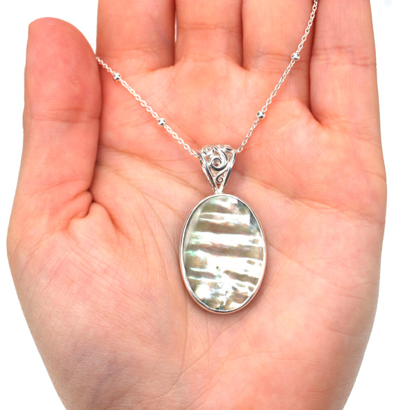 Abalone Swirl Bail Necklace on model for color reference.