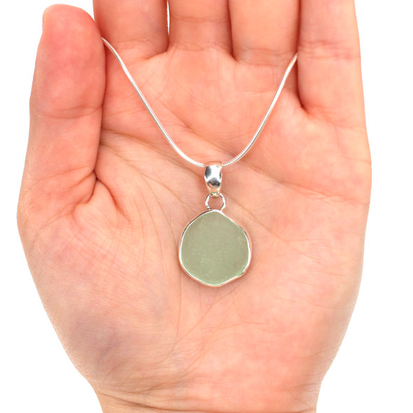 Seafoam Round Sea Glass Single Bezel Necklace on model for color Seafoam Round Sea Glass Single Bezel Necklace on model for color