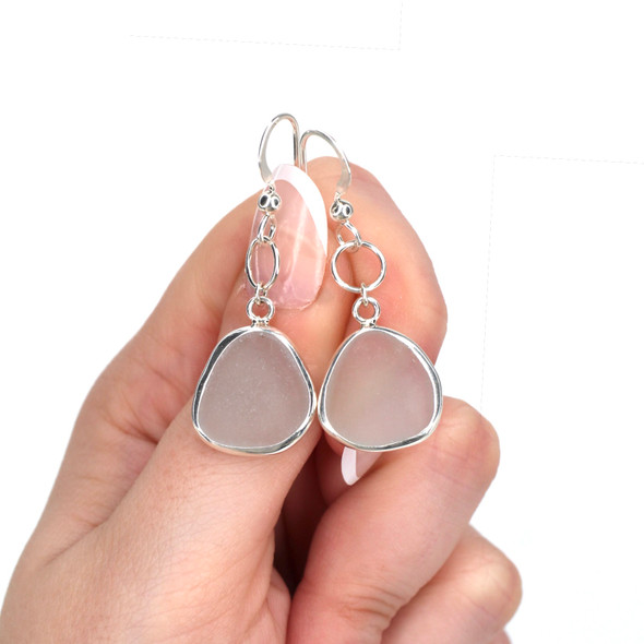 Gray Sea Glass Bezel Wrap Circle Drop Earrings on model for color reference. 