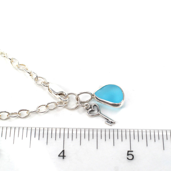 Terrific Turquoise Drop Sea Glass and Key Bracelet on ruler for size reference. 