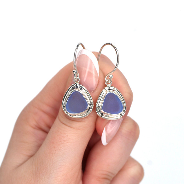 Cornflower Sea Glass Double Bezel Earrings on model for color reference. 