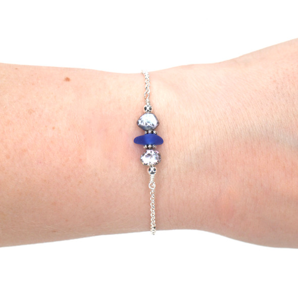 Cobalt Bright Sea Glass and Dainty Peacock Pearl Bracelet on model for color reference.