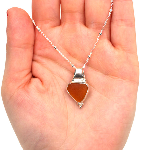 Amber Sea Glass Trinity Slide Necklace on model for color reference. 