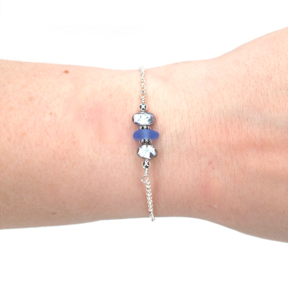 Cornflower Petite Sea Glass and Dainty Peacock Pearl Bracelet on model for color reference.