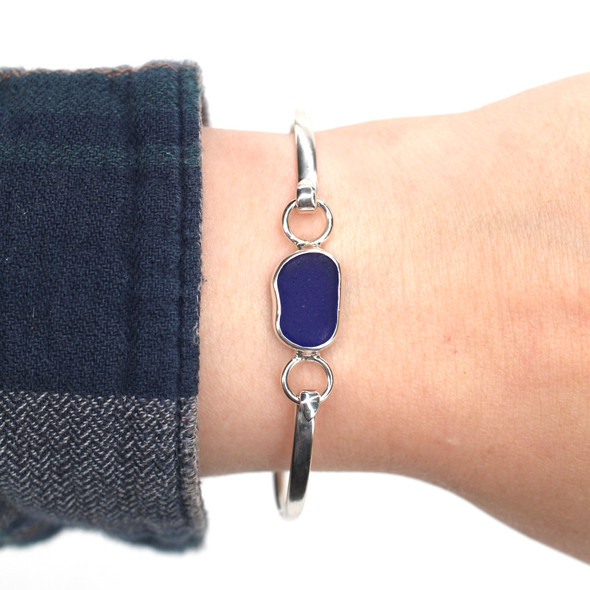 Cobalt Bean Sea Glass Hinge Bangle Bracelet on model for color reference. 