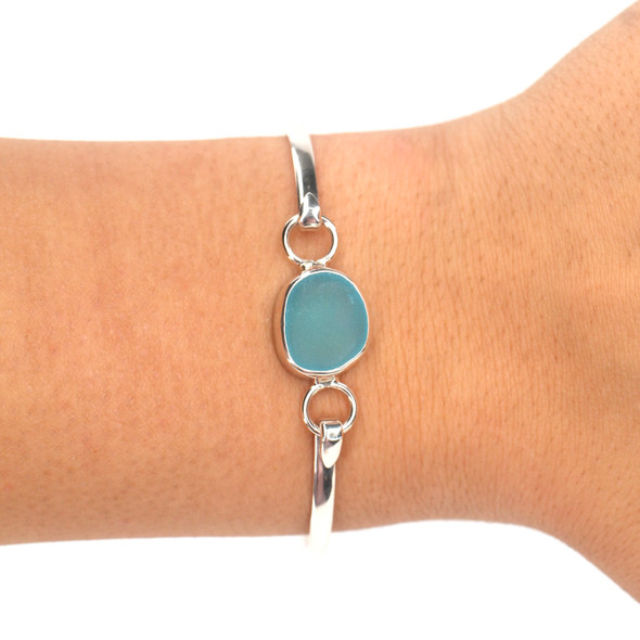Turquoise Rounded Sea Glass Bangle Bracelet on model for color reference. 