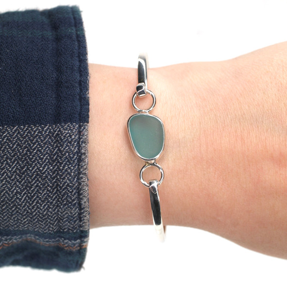 Aqua Deep Sea Glass Hinge Bangle Bracelet on model for color reference. 