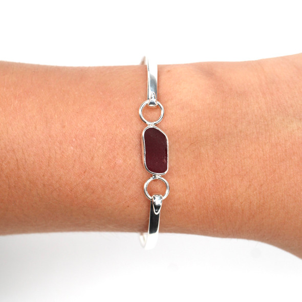 Red Ember Sea Glass Hinge Bangle Bracelet on model for color reference. 