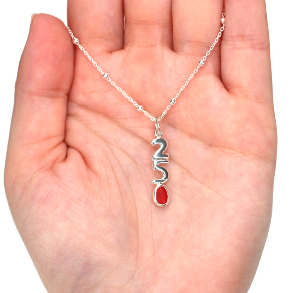 Red-Orange Sea Glass 250 Years Charm Necklace on model for color reference.