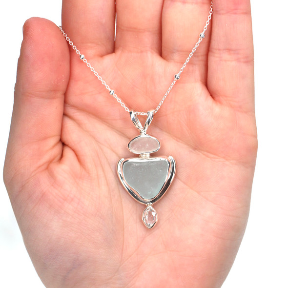 Glacier Sea Glass and Herkimer Diamond Eclipse Necklace on model for color reference.