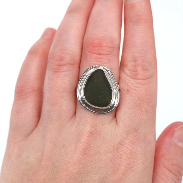 Olive Triangle Sea Glass Nest Ring - Size 9 on model for color reference. Olive Triangle Sea Glass Nest Ring - Size 9 on model for color reference.