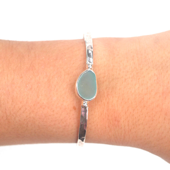 Aqua Sea Glass Beaded Hammered Cuff Bracelet on model for color reference. Aqua Sea Glass Beaded Hammered Cuff Bracelet on model for color reference.