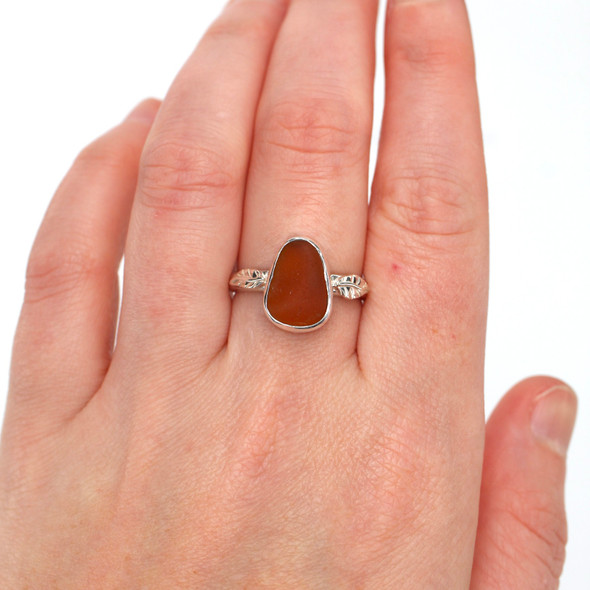Amber Smooth Sea Glass Little Leaf Ring - Size 9 on model for color reference. Amber Smooth Sea Glass Little Leaf Ring - Size 9 on model for color reference.