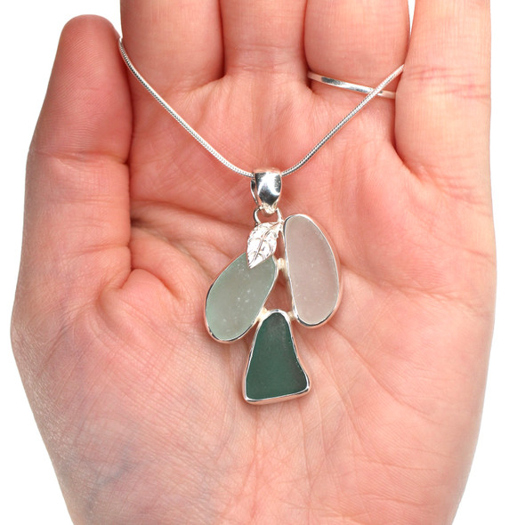 Olive Skies Sea Glass Cascading Leaves Necklace on mode for color reference. Olive Skies Sea Glass Cascading Leaves Necklace on mode for color reference.