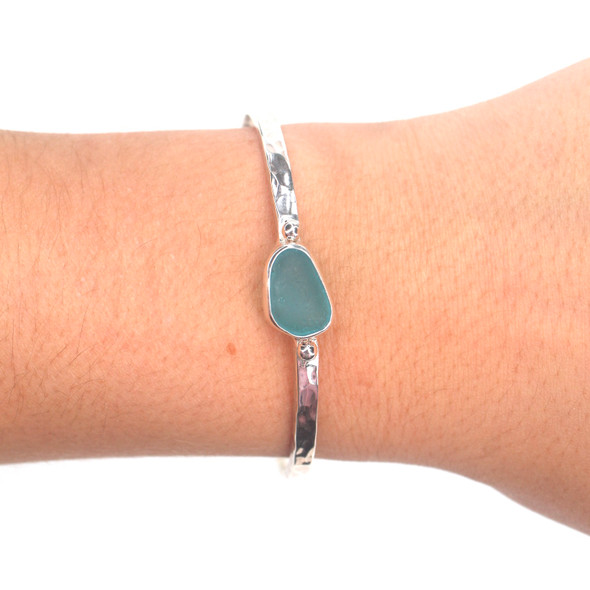 Turquoise Sea Glass Beaded Hammered Cuff Bracelet on model for color reference. Turquoise Sea Glass Beaded Hammered Cuff Bracelet on model for color reference.