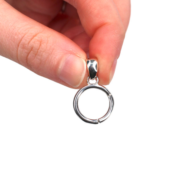 Sterling Silver Charm Holder Pendant PRE-ORDER held to the light