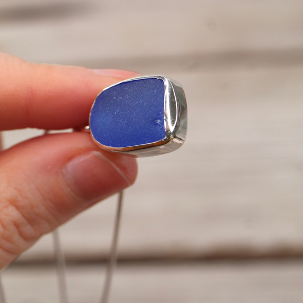 Cobalt Ghost Sea Glass Bezel Necklace showing chip