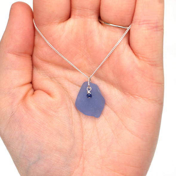 Cornflower Sea Glass and Lapis Gemstone Drop Necklace on model for color reference.