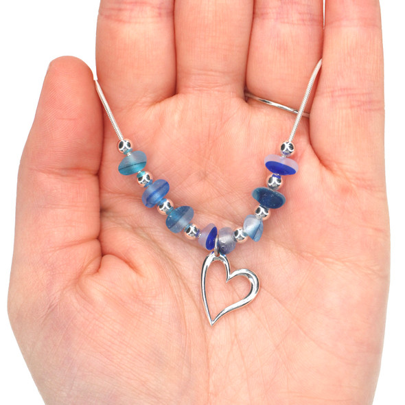 Blue Ocean Waves Ultra Rare Sea Glass 8 Stone Heart Charm Necklace - 16"-18" Length on model for color reference. 