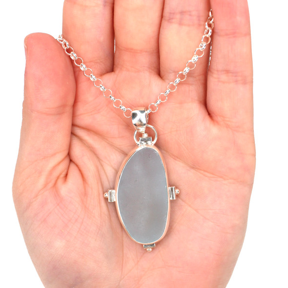 Aqua Ice Sea Glass Square Necklace on model for color reference. Aqua Ice Sea Glass Square Necklace on model for color reference.