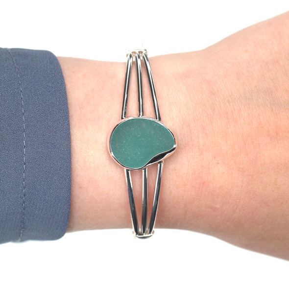 Aqua Sea Glass Three Piece Bracelet on model for color reference. Aqua Sea Glass Three Piece Bracelet on model for color reference.