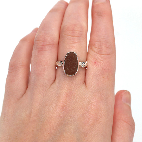Amber Oval Sea Glass Little Leaf Ring - Size 9 on model for color reference. Amber Oval Sea Glass Little Leaf Ring - Size 9 on model for color reference.