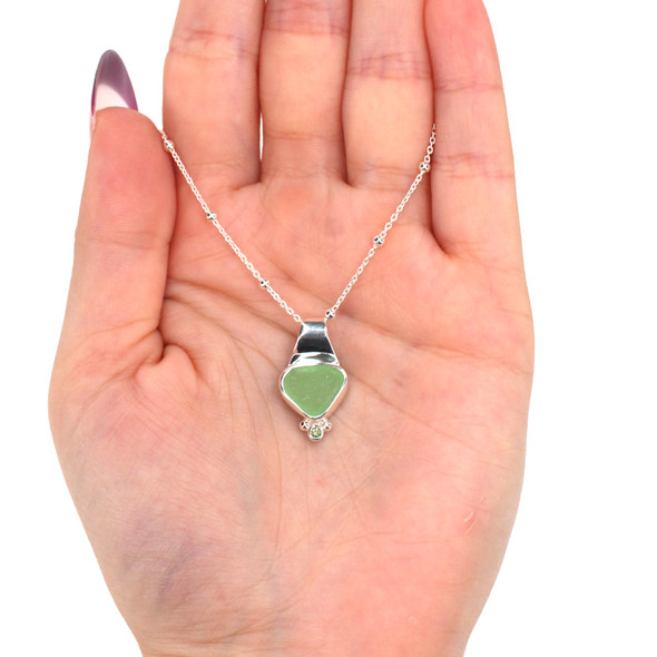 Seafoam Bright Delight Sea Glass and Peridot Petite Slide Necklace on model for color reference. Seafoam Bright Delight Sea Glass and Peridot Petite Slide Necklace on model for color reference.