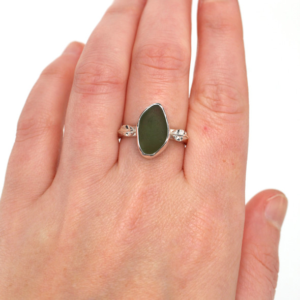 Olive Breeze Sea Glass Little Leaf Ring - Size 9 on model for color reference. Olive Breeze Sea Glass Little Leaf Ring - Size 9 on model for color reference.