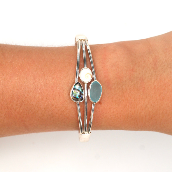 Aqua Light Sea Glass Three Piece Cuff Bracelet on model for color reference. Aqua Light Sea Glass Three Piece Cuff Bracelet on model for color reference.