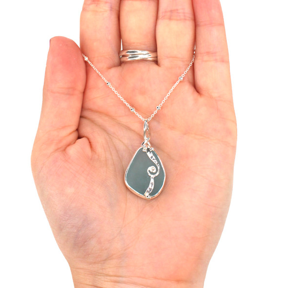 Aqua Smooth Sea Glass Wave Necklace on model for color reference. 
