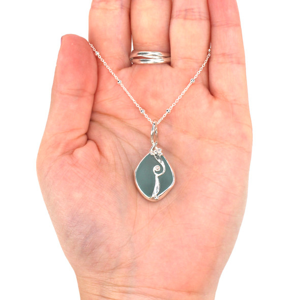 Aqua Sea Glass Wave Necklace on model for color reference. 

