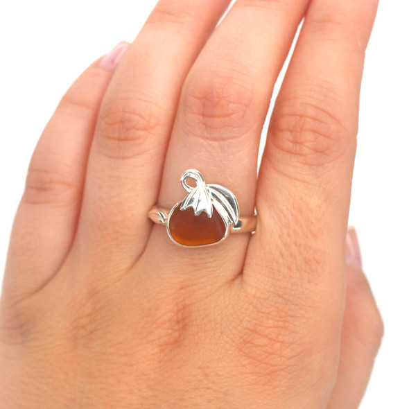 Amber Sea Glass Pumpkin Ring - Size 9 on model for color reference. Amber Sea Glass Pumpkin Ring - Size 9 on model for color reference.