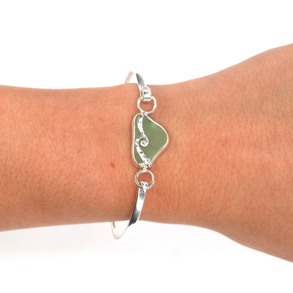 Seafoam Sea Glass Wave Bracelet on model for color reference. 