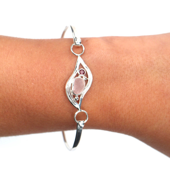 Pink Sea Glass and Ruby Wavy Hinge Bangle Bracelet on model for color reference.